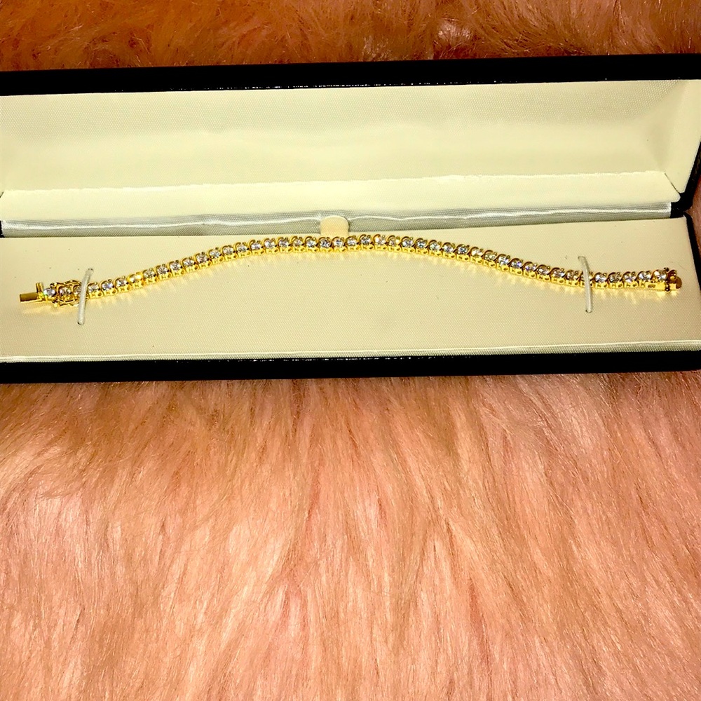Gold plated sterling silver CZ  7 1/2 inch tennis bracelet